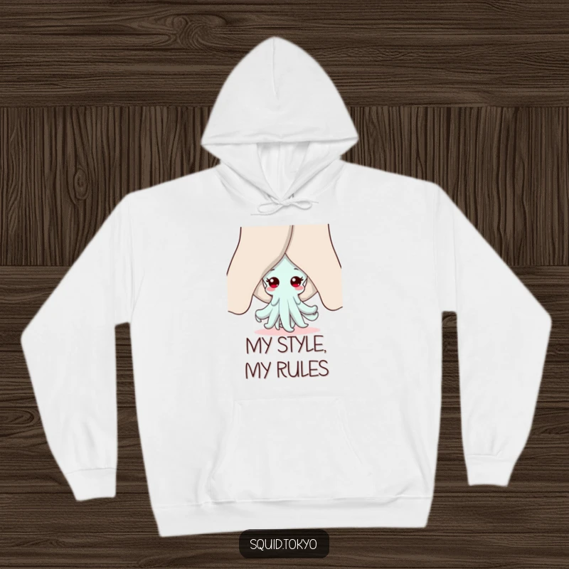 Funny Kawaii squid hoodie, peeking shyly from behind large sleeves, exuding warmth and playful charm, ideal for casual wear.